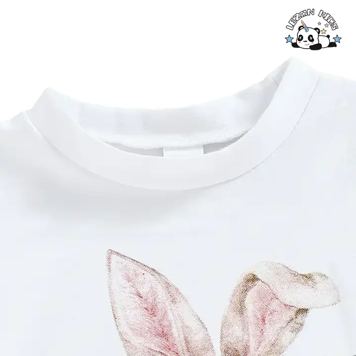 LEZONKIDS - Conjunto de Roupas de Meninas com Logo Personalizado, Camiseta de Manga Curta com Borla de Coelho de Desenho Animado e Calças Flared Impressas para Festas de Páscoa